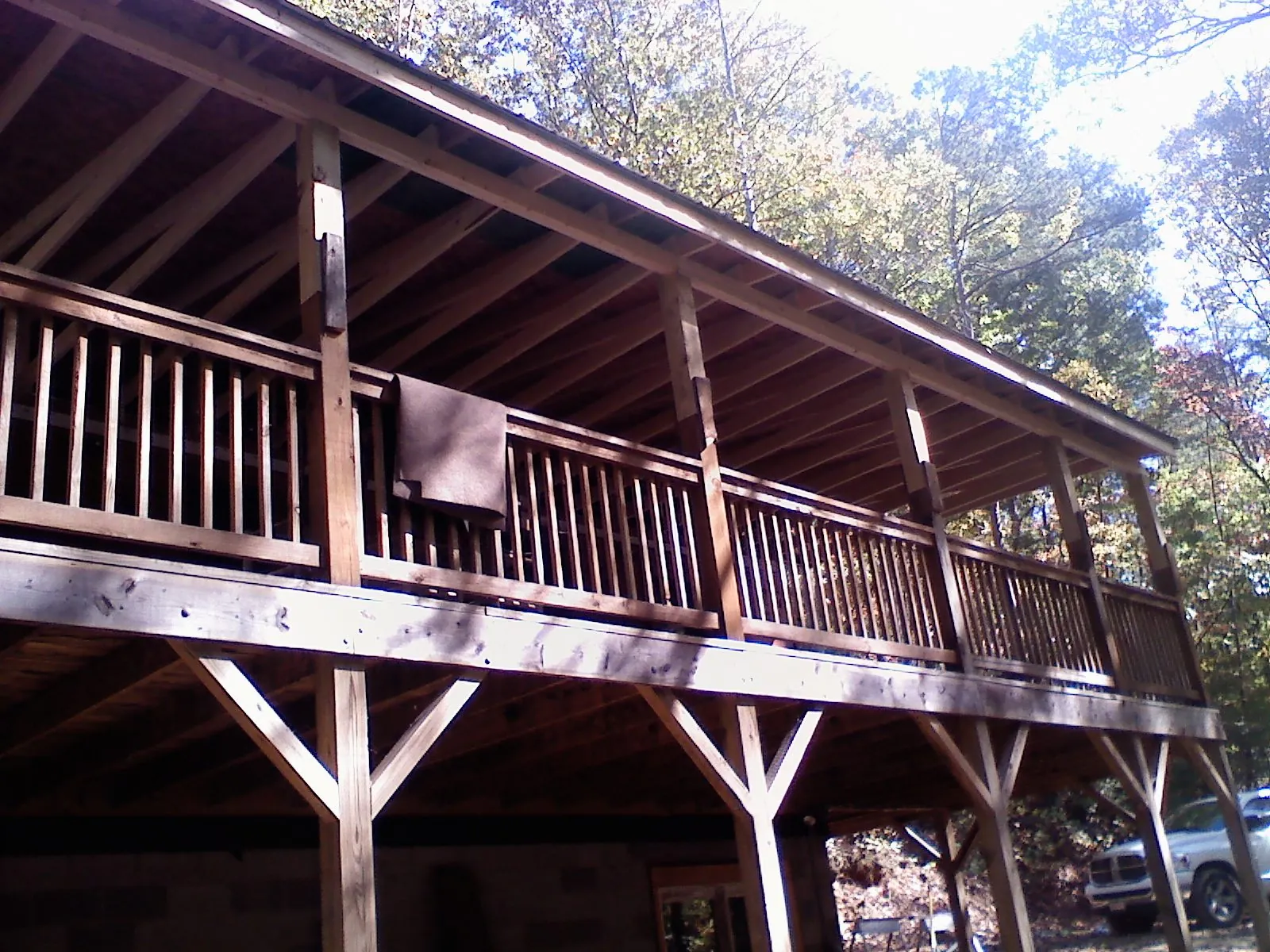 Timber framing under a new elevated porch and deck — Roof Leak Repair in Junction City by Roofing Brothers